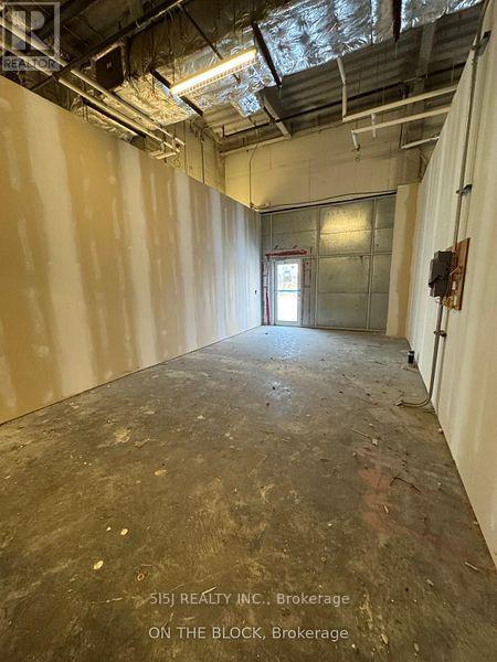 1FC11 / 10 - 9390 WOODBINE AVENUE