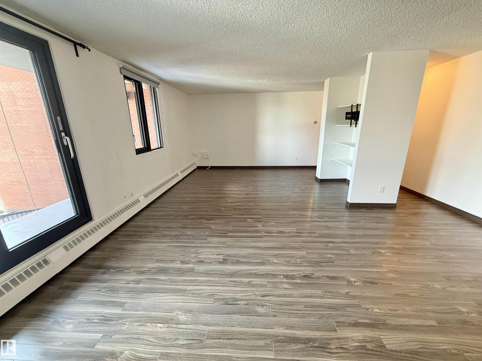 #409 10145 109 st NW