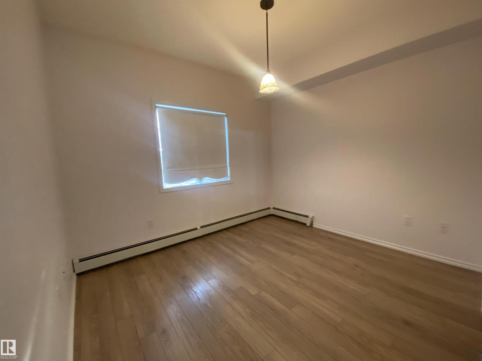 #206 16715 100 AV NW