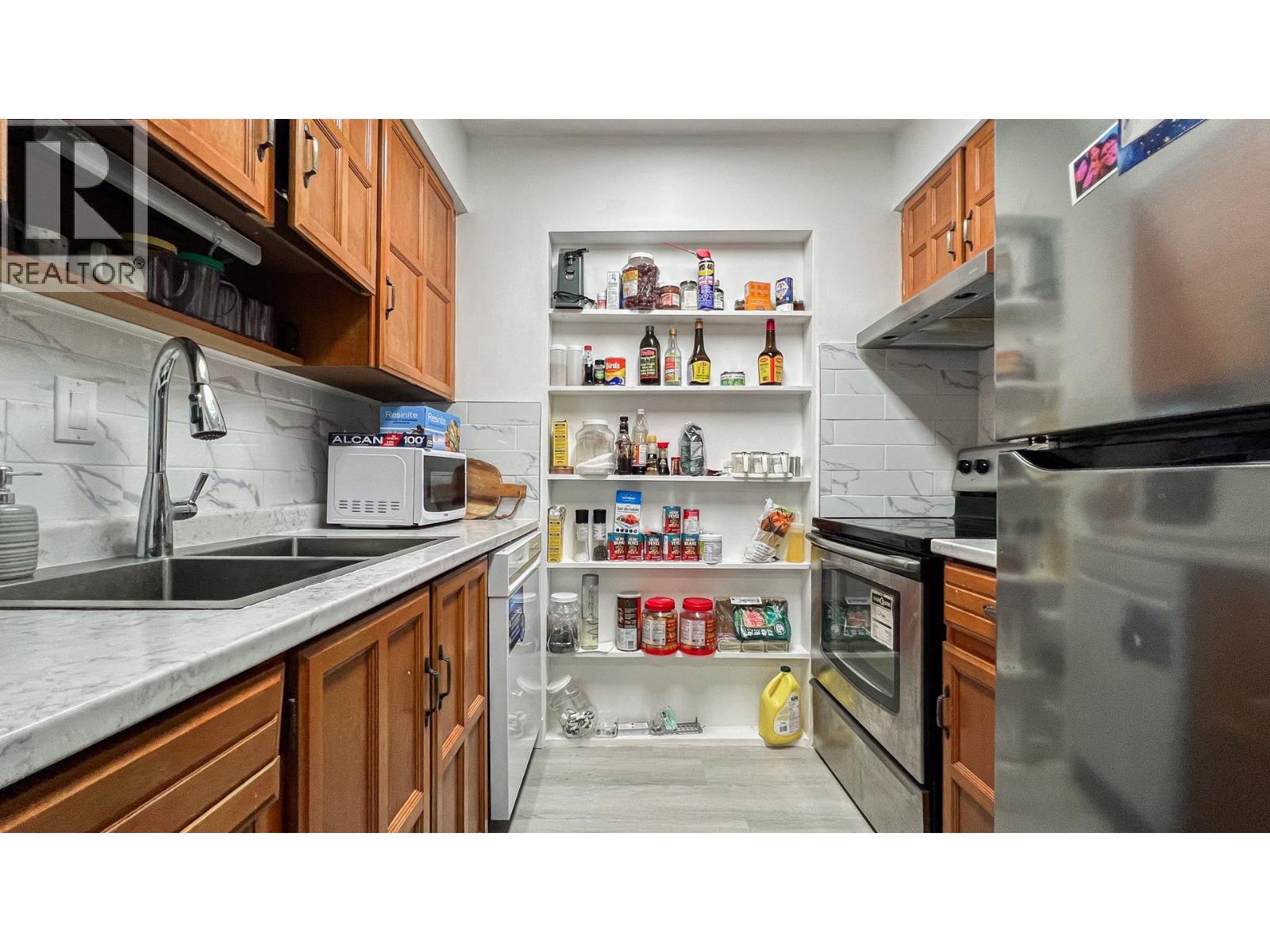 311 11240 DANIELS ROAD