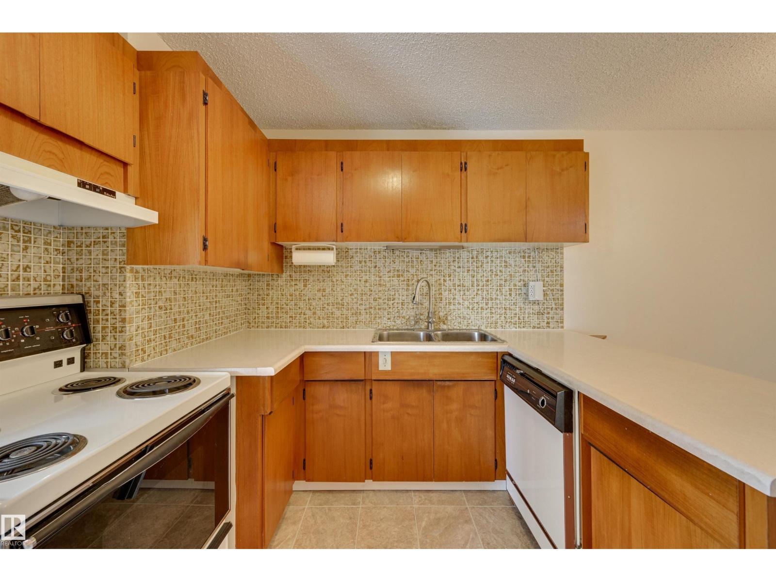 #502 11710 100 AV NW