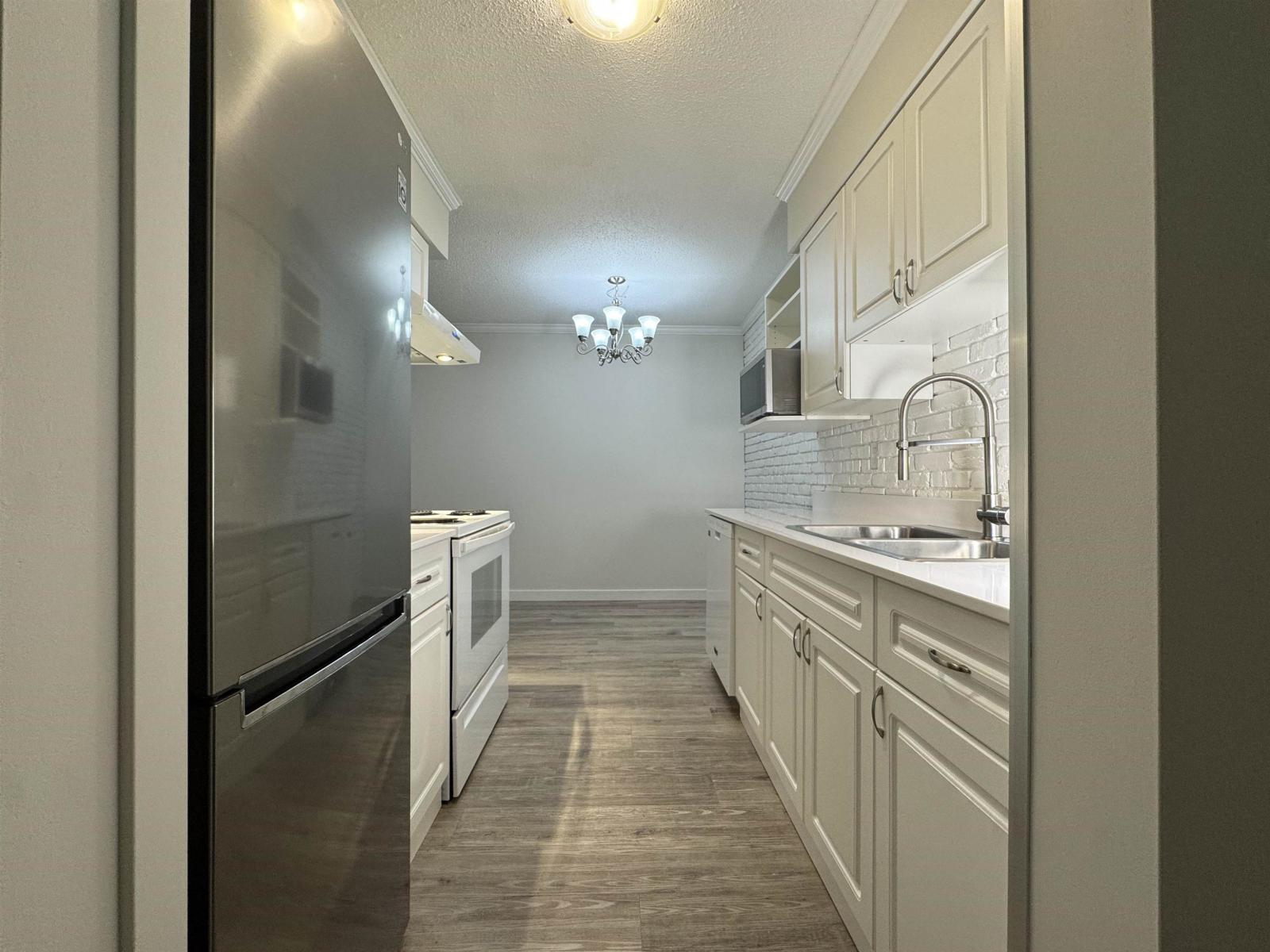 124 11806 88TH AVENUE