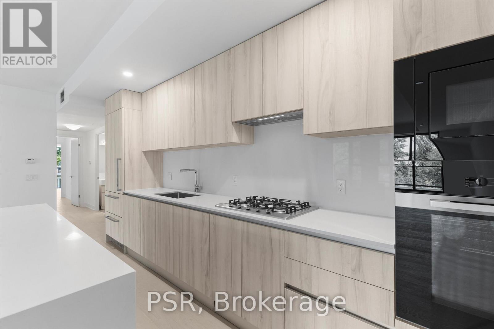 303 - 200 KEEWATIN AVENUE