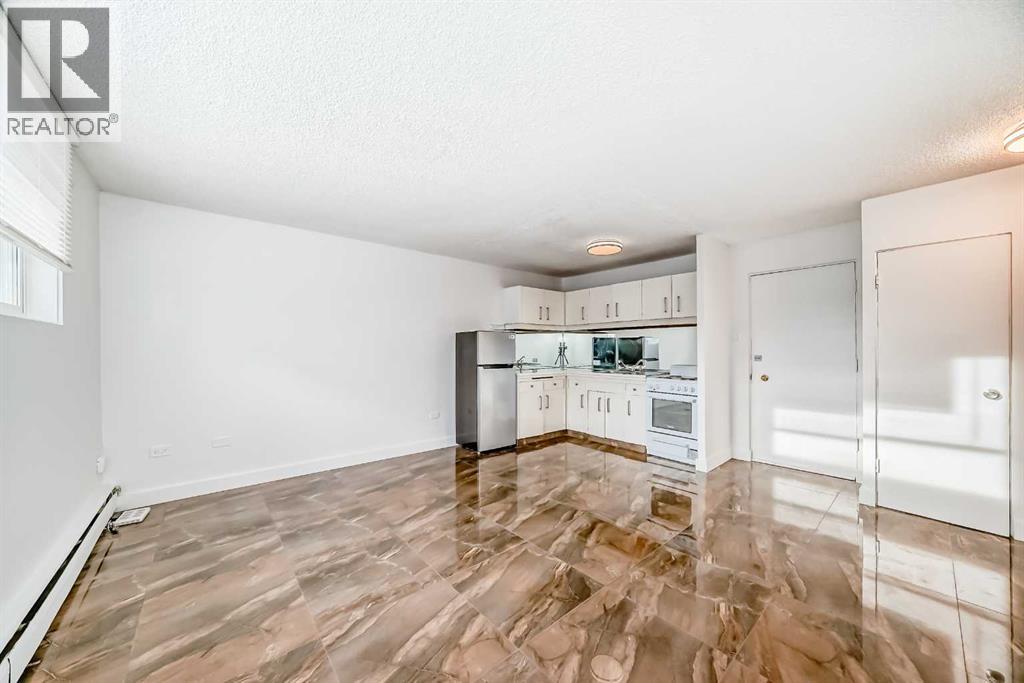 102, 316 1 Avenue NE