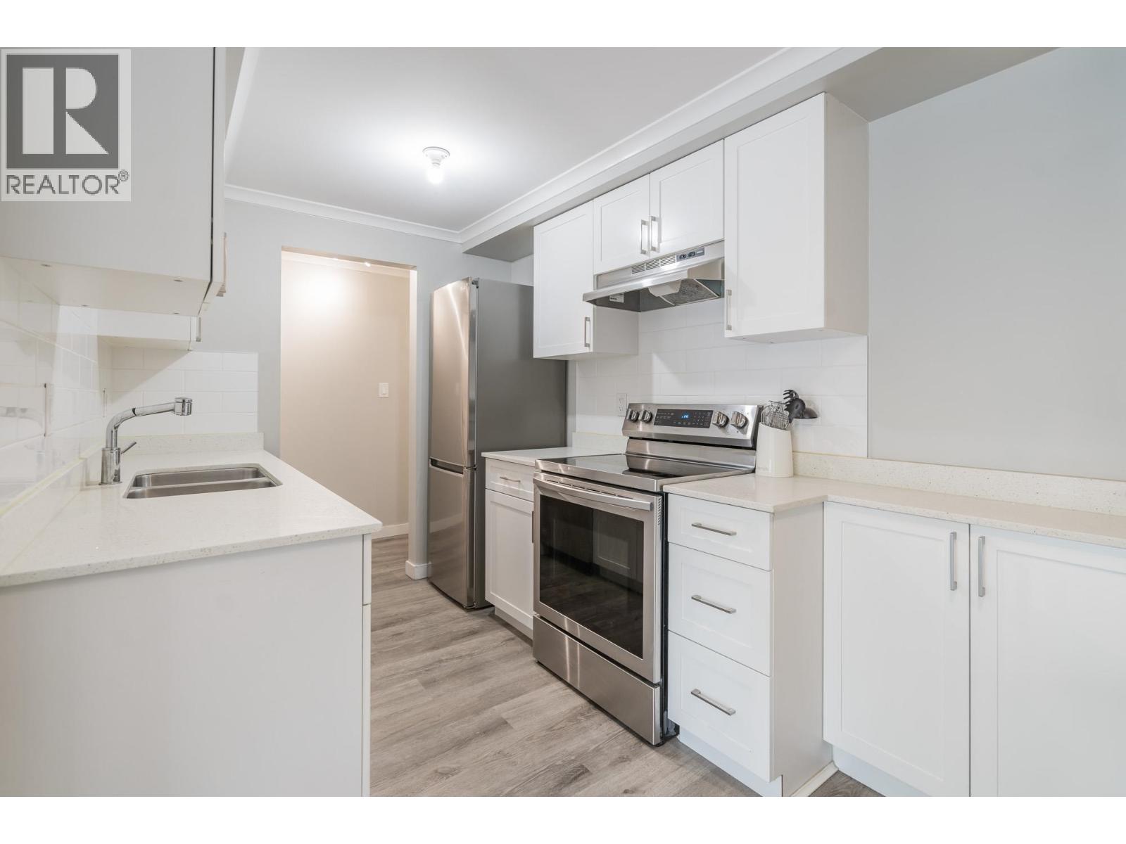 203 2036 COQUITLAM AVENUE