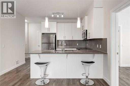 313, 12 Sage Hill Terrace NW