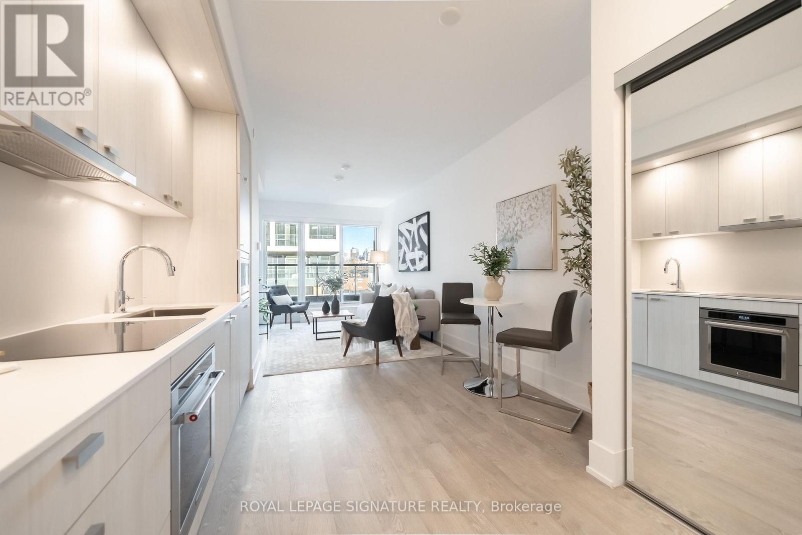 303 - 119 DENISON AVENUE