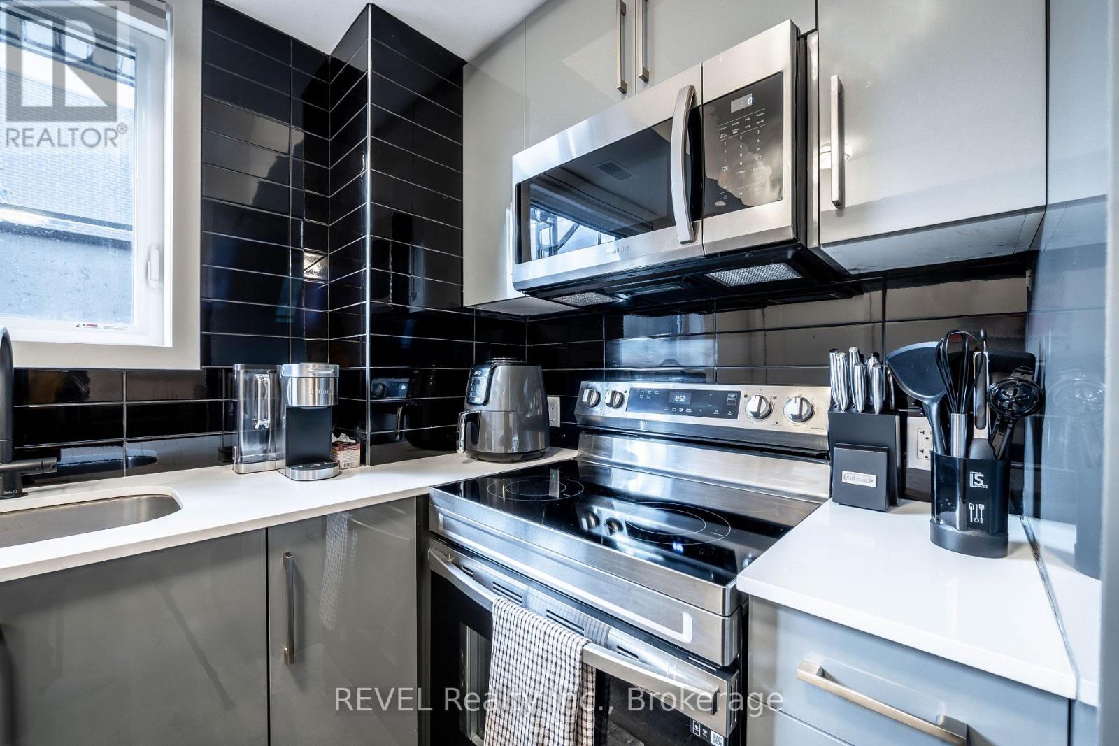 114 - 6065 MCLEOD ROAD