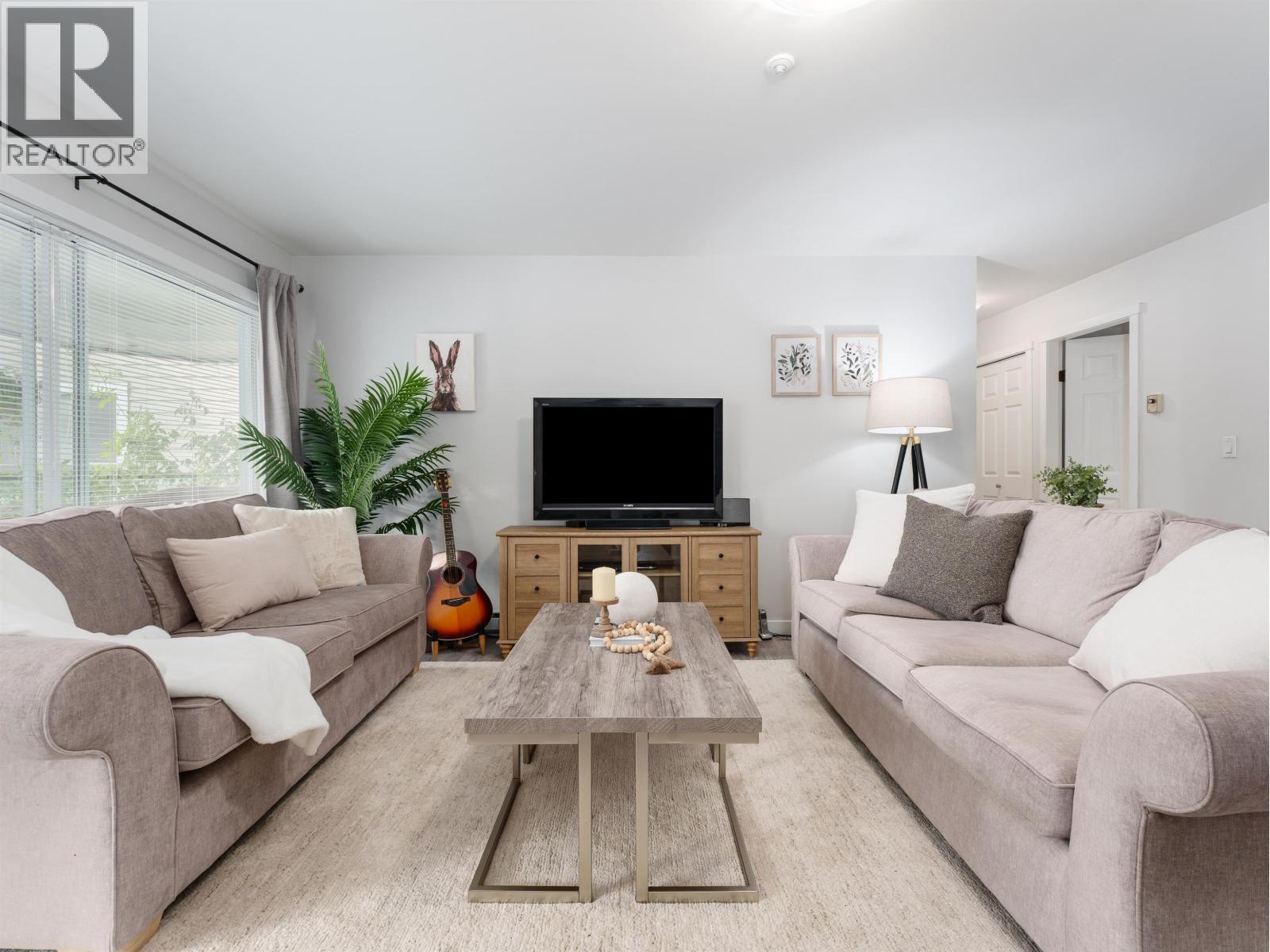 212 3690 BANFF COURT