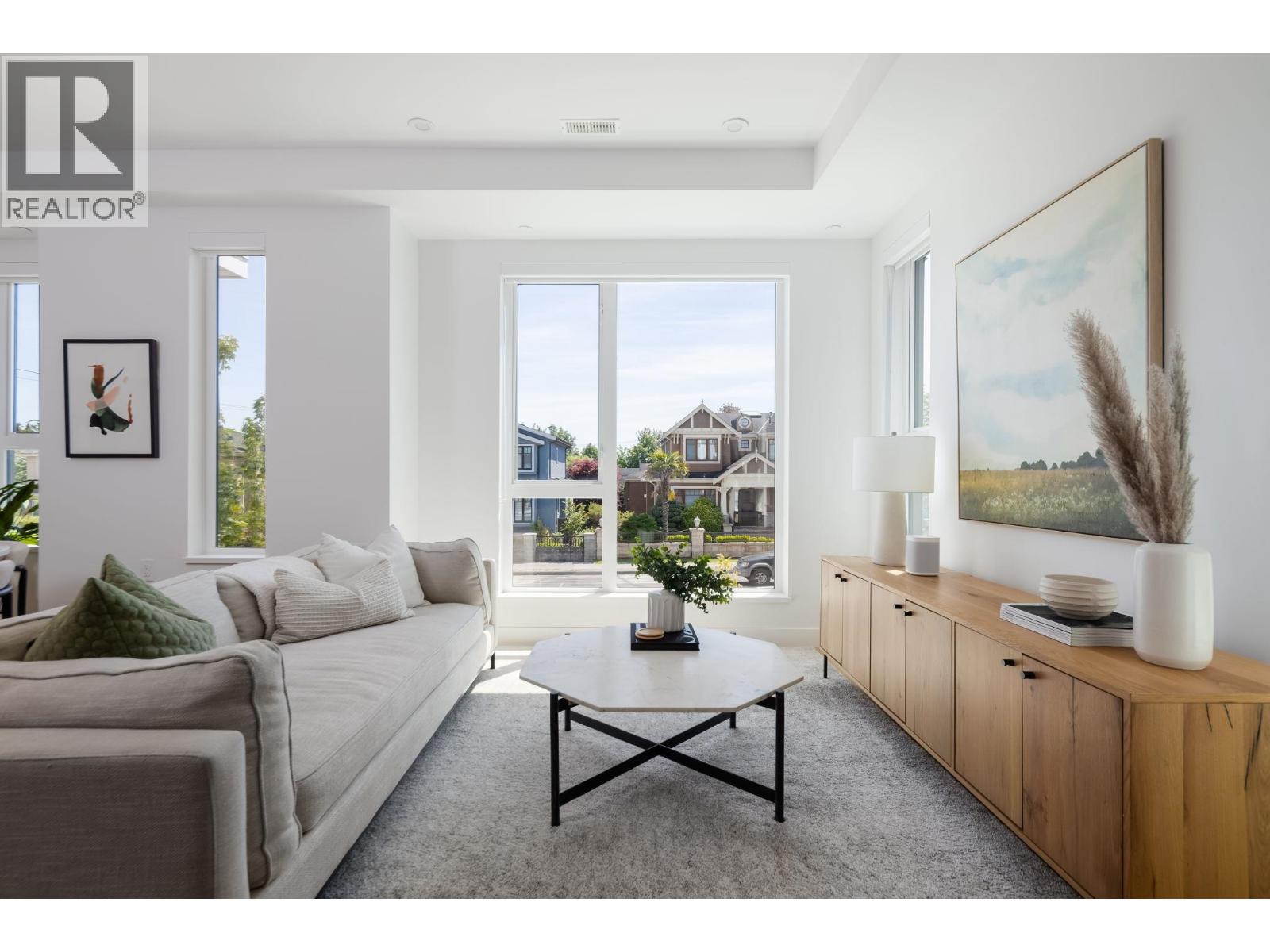 213 715 W 49TH AVENUE